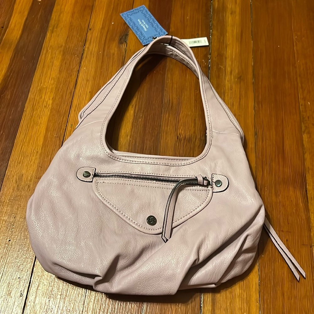 Brand New!  Tags on! Lots of compartments! Medium / Large purse